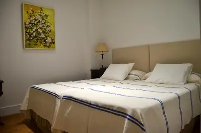 Cama o camas de una habitación en bt6sevilla