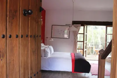 Cama o camas de una habitación en El Balcón del Huéznar