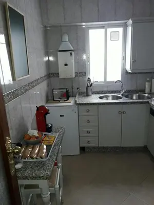 Una cocina o zona de cocina en Apartamento Avenida Parque
