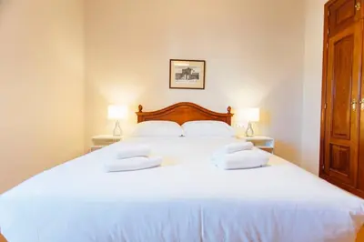 Cama o camas de una habitación en Duplex with terrace- 5Bd 3Bth- Center