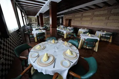 Un restaurante o sitio para comer en Hotel Lozano