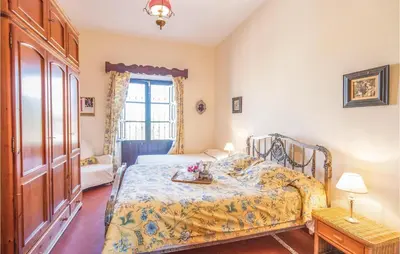 Cama o camas de una habitación en Gorgeous Home In La Campana, Sevilla
