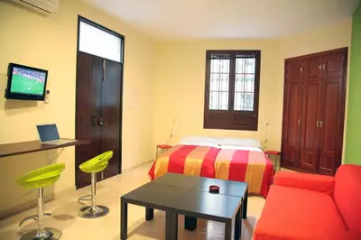 Zona de estar de Rey de Sevilla Flats - Macarena