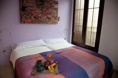 Cama o camas de una habitación en Rey de Sevilla Flats - Macarena
