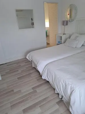 Cama o camas de una habitación en Apartamentos Flamenco B&B