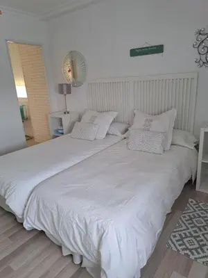 Cama o camas de una habitación en Apartamentos Flamenco B&B