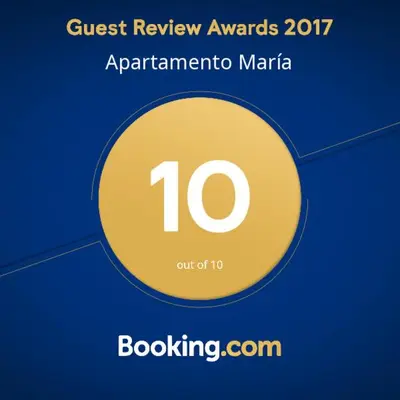 Certificado, premio, señal o documento que está expuesto en Apartamento María