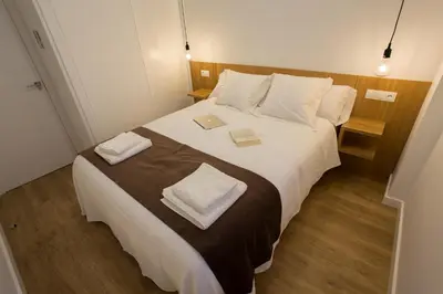 Cama o camas de una habitación en SunShine Puerta de San Francisco
