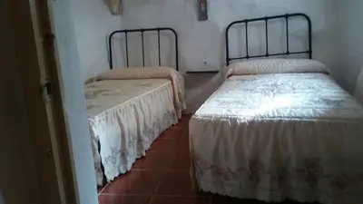 Cama o camas de una habitación en Cueva Rural La Noguera