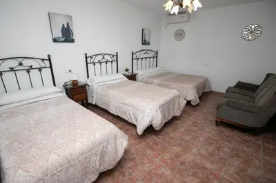 Cama o camas de una habitación en Casa Rural El Olmo