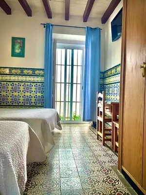 Cama o camas de una habitación en Hostal Lis