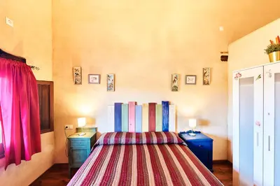 Cama o camas de una habitación en Casa Rural Sierra Jayona