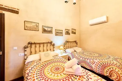 Cama o camas de una habitación en Casa Rural Sierra Jayona