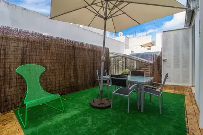 Un patio o zona al aire libre en La Casa del Conde de Gelves Apartments