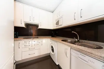 Una cocina o zona de cocina en La Casa del Conde de Gelves Apartments