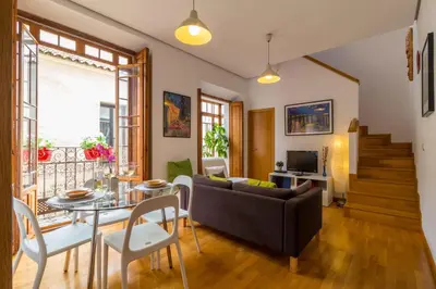 Zona de estar de La Casa del Conde de Gelves Apartments