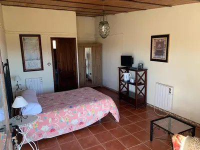 Cama o camas de una habitación en Villa Rural Sierra Hueznar