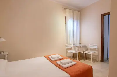 Cama o camas de una habitación en RentalSevilla Cano y Cueto III
