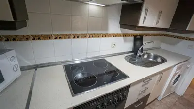 Una cocina o zona de cocina en RentalSevilla San Clemente