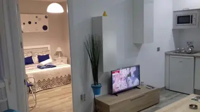 Cama o camas de una habitación en Pompeyos Viviendas Vacacionales