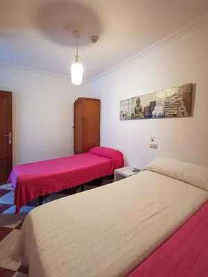 Cama o camas de una habitación en Pension Hidalgo 1