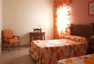 Cama o camas de una habitación en Hotel Rural Miguel Angel