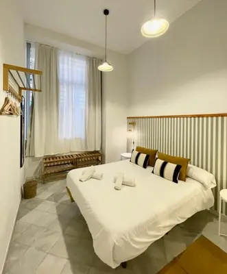 Cama o camas de una habitación en New Samay Hostel