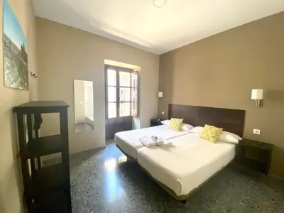 Cama o camas de una habitación en Patio de la Plateria