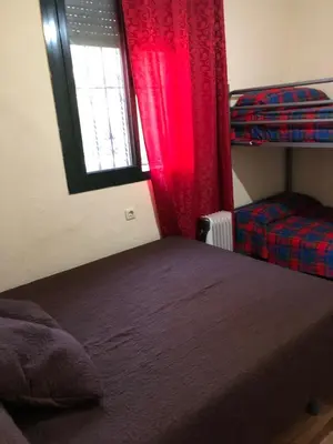 Cama o camas de una habitación en Casa rural en Constantina