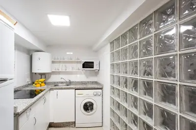 Una cocina o zona de cocina en Apartamentos Diaber Gerona 22
