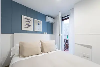 Cama o camas de una habitación en Apartamentos Diaber Gerona 22