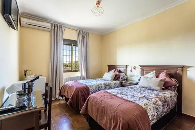 Cama o camas de una habitación en Complejo turistico El Álamo