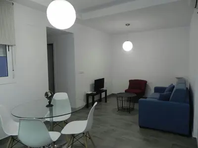 Zona de estar de Atico con terraza en Alameda de Hercules