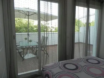 Un balcón o terraza de Atico con terraza en Alameda de Hercules