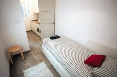Cama o camas de una habitación en the apatment/el apartamento City centre