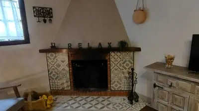 Una televisión o centro de entretenimiento en Casa La Liebrecilla