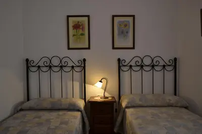 Cama o camas de una habitación en Apartamentos Rurales Parque