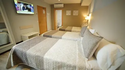 Cama o camas de una habitación en Hotel Infante Antequera