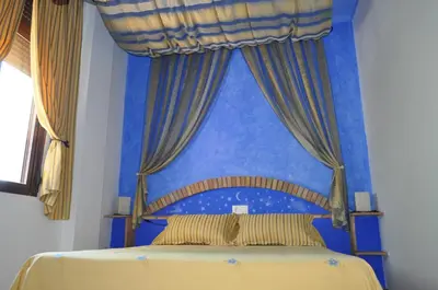 Cama o camas de una habitación en Apartamentos Rurales Alcazaba de las Torres