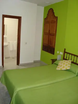 Cama o camas de una habitación en Hostal Durán