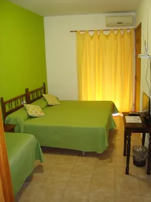Cama o camas de una habitación en Hostal Durán