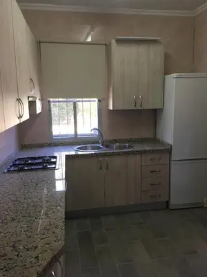 Una cocina o zona de cocina en Chalet piscina jakuzzi sevilla