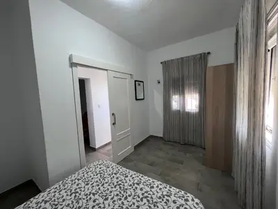 Cama o camas de una habitación en Chalet piscina jakuzzi sevilla
