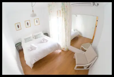 Cama o camas de una habitación en La Peluquería