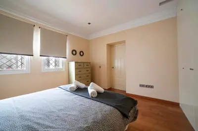 Cama o camas de una habitación en Alohamundi Quevedo