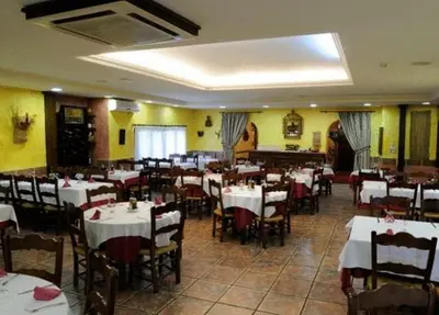 Un restaurante o sitio para comer en Hotel El Oasis