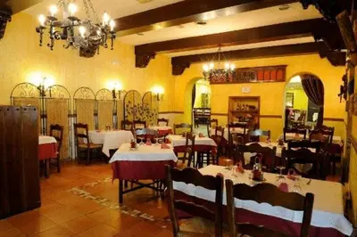 Un restaurante o sitio para comer en Hotel El Oasis