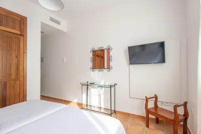 Cama o camas de una habitación en Hotel Rural El Castillejo - A 15 min de Ronda