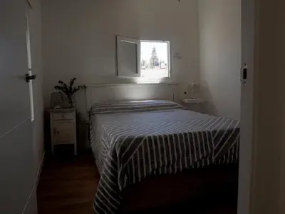 Cama o camas de una habitación en Apartamento en Judería La Murallita