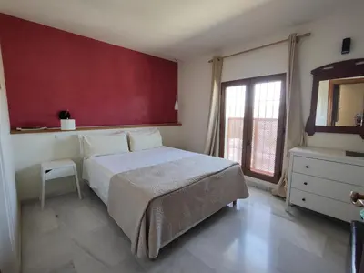 Cama o camas de una habitación en Balcón de la Villa